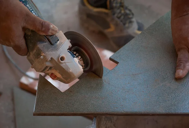 tiler, floor tile, grinder, worker, construction site, tiler, tiler, tiler, tiler, tiler, grinder, construction site. Business records to check in flooring contractor software